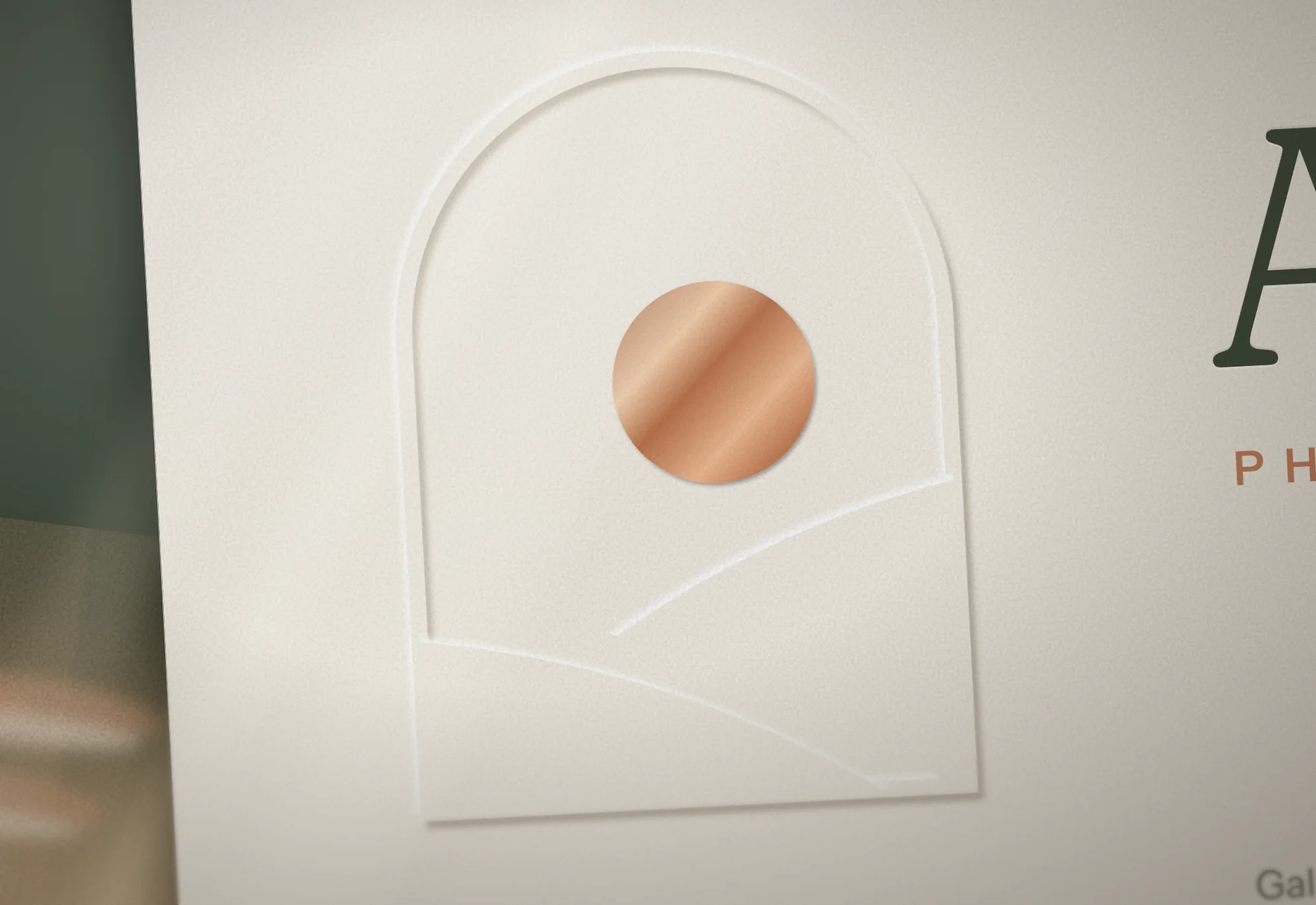 Ardú Physiotherapy: Print detail · copper foil sun, blind-embossed arch